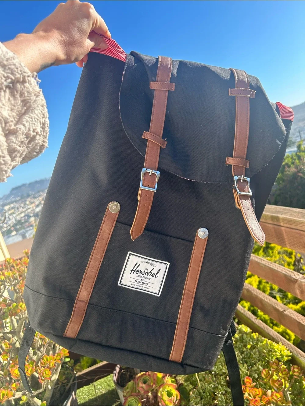Herschel Supply Company Black Backpack with Brown Trim and Red Handle Accent